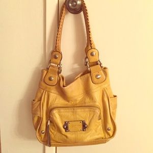 Beautiful yellow, soft genuine leather handbag.