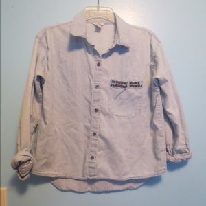 Long Sleeved Cropped Denim Button Down.