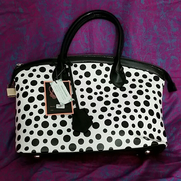 Patent polka dot handbag