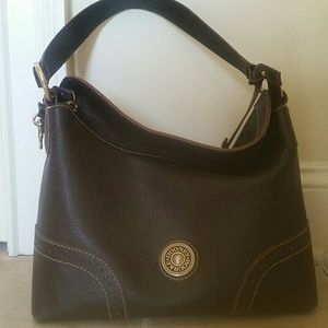 Brown leather vintage Dooney & Bourke satchel.