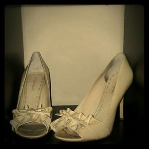 Enzo Angiolini Cream Patent Ruffle Pumps
