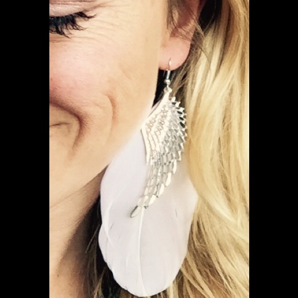 Angel wing feather earrings new in package