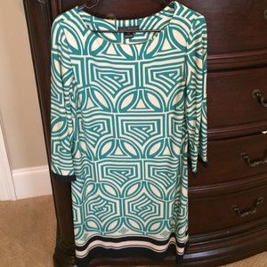 Navy, teal, and cream dress.