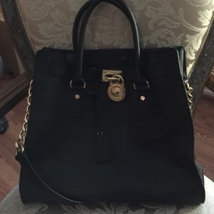 Michael Kors big black Hamilton bag with gold.