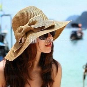 Tan Floppy Hat with Bow on side