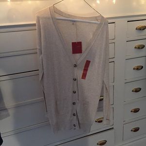 Tan colored brand new cardigan