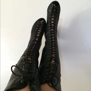 Knee high lace up boots