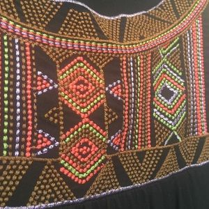 Black, sleeveless blouse w/ gorgeous neck detail