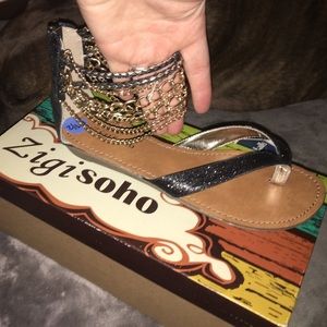 Black& gold flip flops