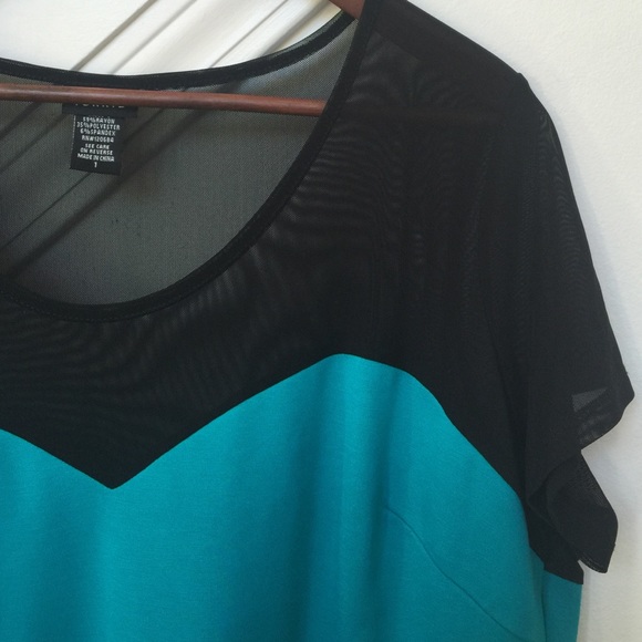 Black and turquoise peplum top