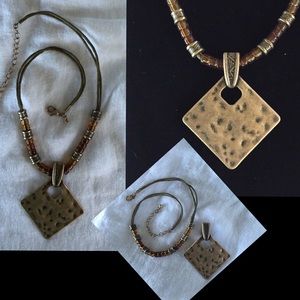 'Bali' leather necklace and pendant. NEW.