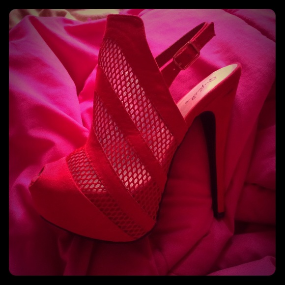 Open toed Red stilettos hills