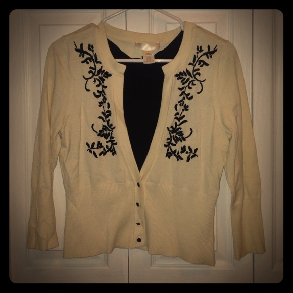 Classic ivory sweater with black embroidery