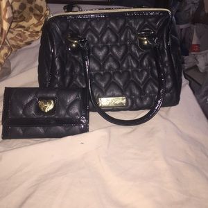 Like new Betsy Johnson purse and wallet set!