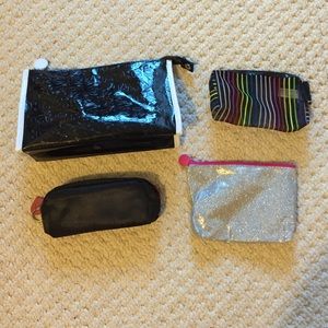 Set of 4, rarely used, makeup bags