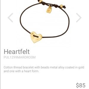 A brown Uno de 50 bracelet