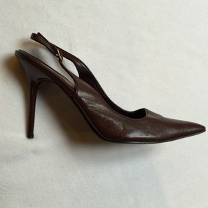 Bundle of brown heels and long sleeve shirt