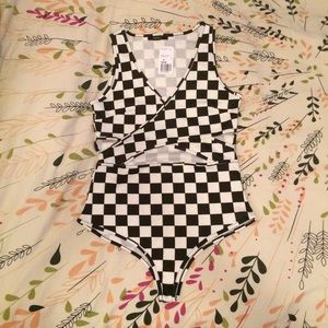 Checkerboard print cut out bodysuit