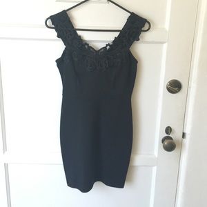 Little black dress with embroidery.