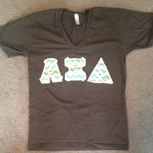 Light blue alpha xi delta stitched letters