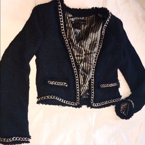Cropped black/shimmer tweed with gold chain trim