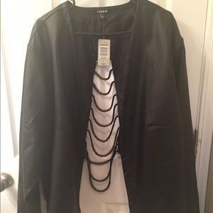Torrid size 5  beaded back faux leather jacket