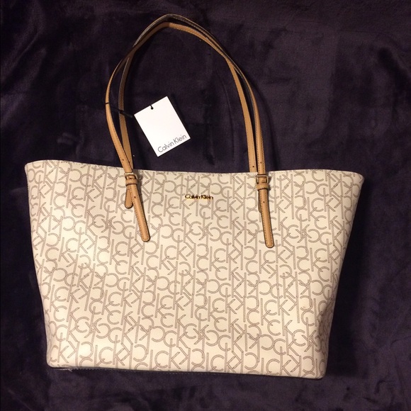 NWT Calvin Klein almond colored CK monogrammed bag