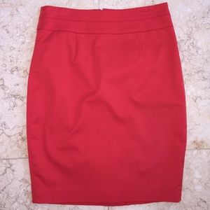 SOLD.   BEBE coral pencil skirt perfect condition