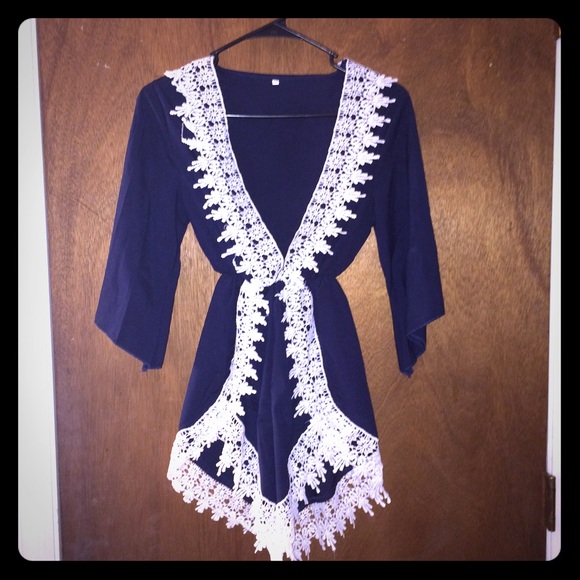 SUPER CUTE blue romper with white lace detailing