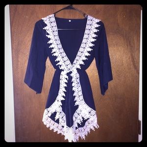 SUPER CUTE blue romper with white lace detailing