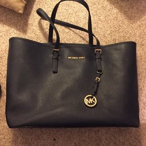 Hardly used Michael Kors tote in dark blue