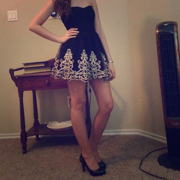 Beautiful short black dress with gold embroidery