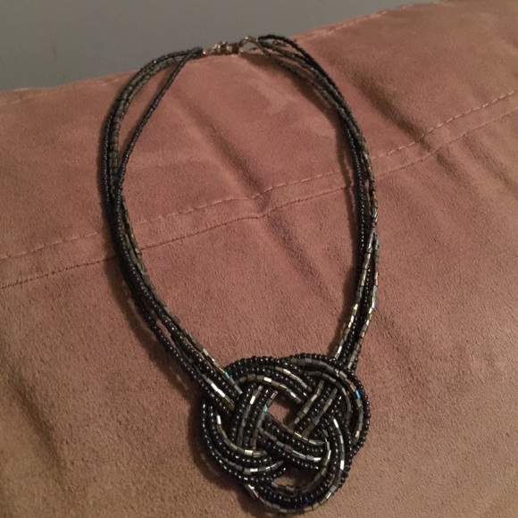 Beautiful black and gold knot necklace