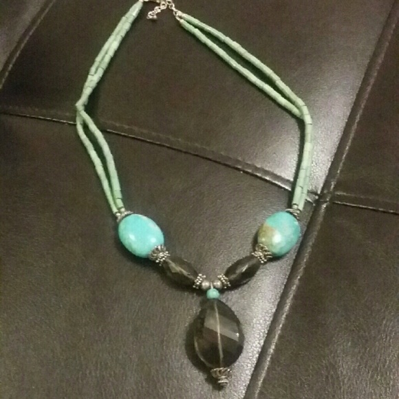 Stone necklace.