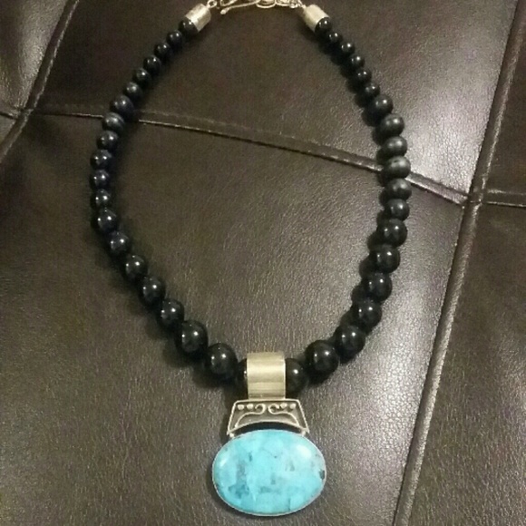 Stone necklace.