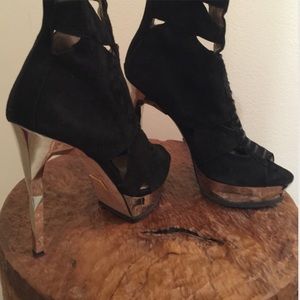 Italian designer stilettos.Used once @ NYE party!.