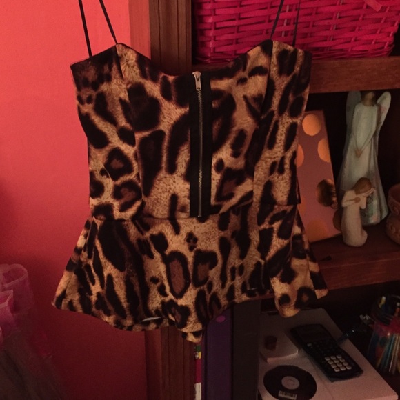 Cheetah print top. NEVER BEEN WORN