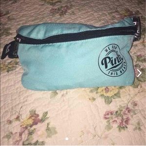 PINK mint fanny pack with a black beverage holder