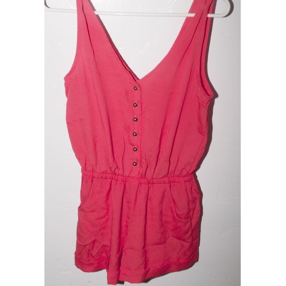 Pink Urban Outfitters romper.