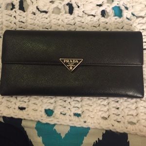 Prade black leather wallet in perfect condition
