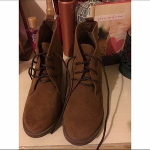 Dark heeled booties with laces