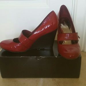 BCBGirls Red patent leather wedges.