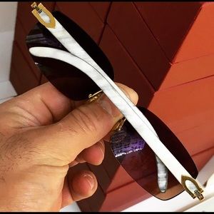 100% authentic Cartier White buffs