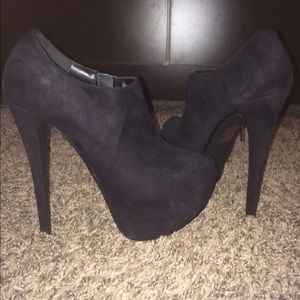 Black suede booties.