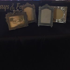 Four silver 2x3 picture frames