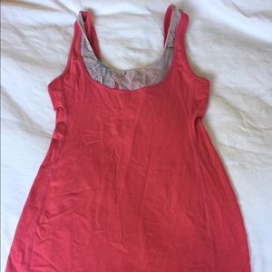 Coral tank with design around neckline size 6