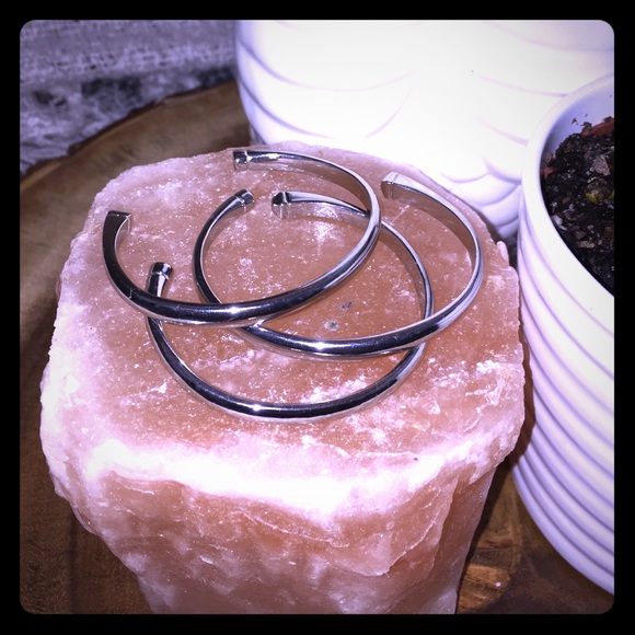 Set of three silver bangles