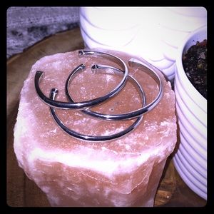 Set of three silver bangles