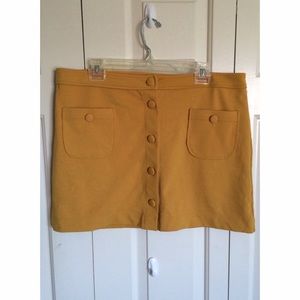 Mustard colored button skirt