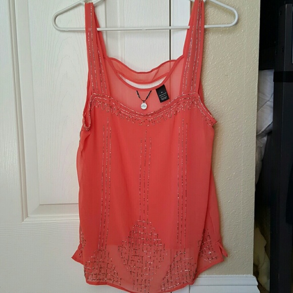 Super cute orange beaded top!